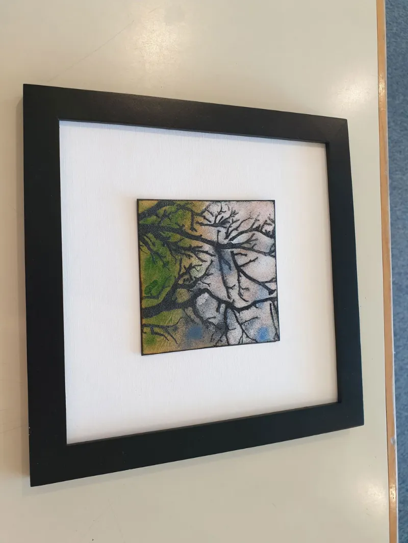 Framed enamel panel by Caroline Ingram