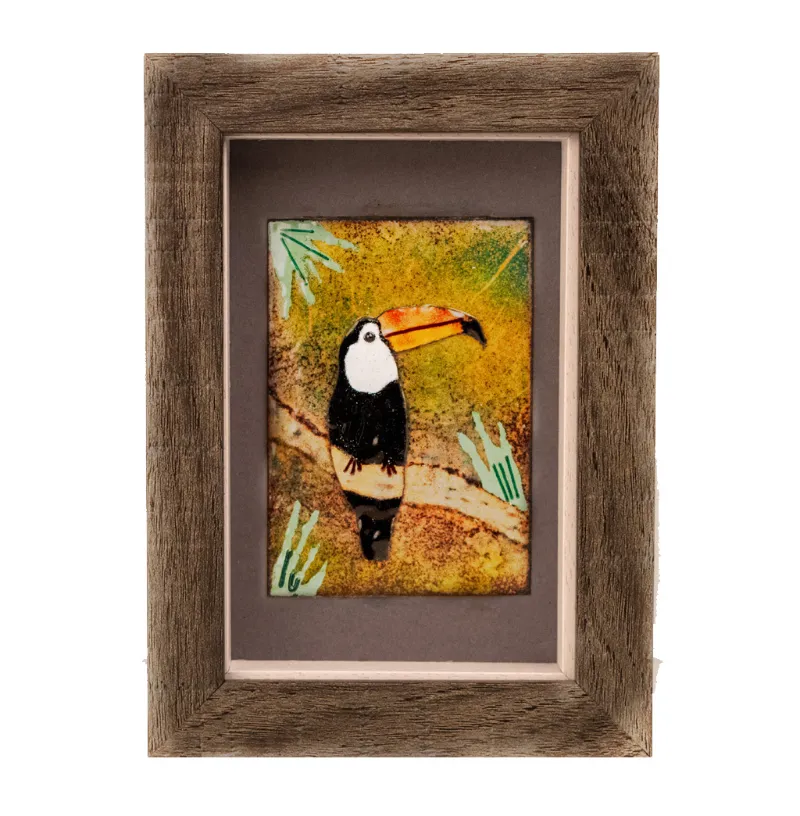 Enamel panel of a toucan by Caroline Ingram